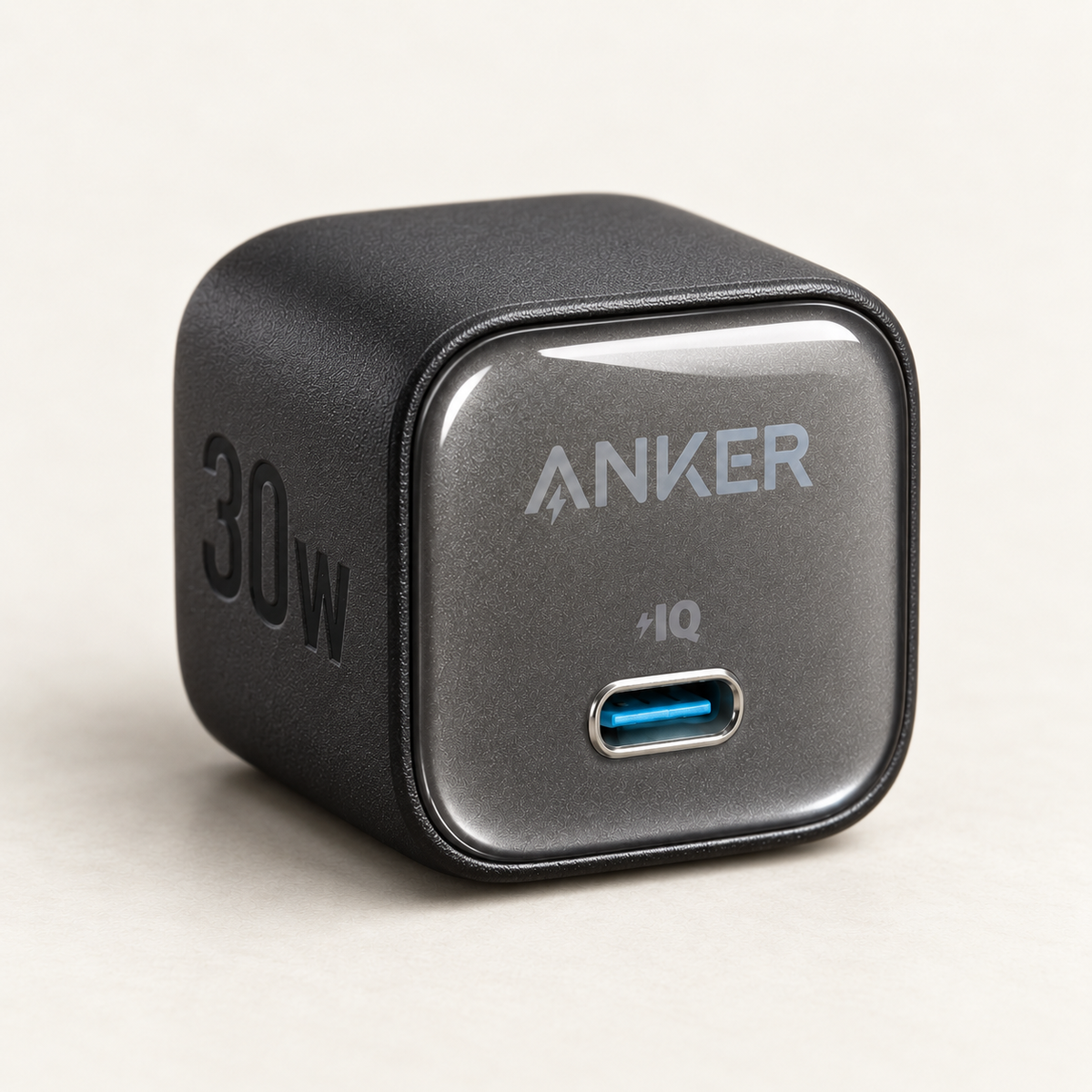 Compact black Anker Zolo 30W charger showing its square glossy face and single USB-C port