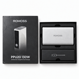 ROMOSS PPU20 130W 20000mAh silver power bank with opened original box — studio-enhanced photo